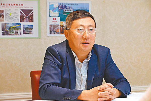 ■鄭啟文稱香港國安法可令旅客重拾訪港信心，也有利香港市民安居樂業。香港文匯報記者  攝