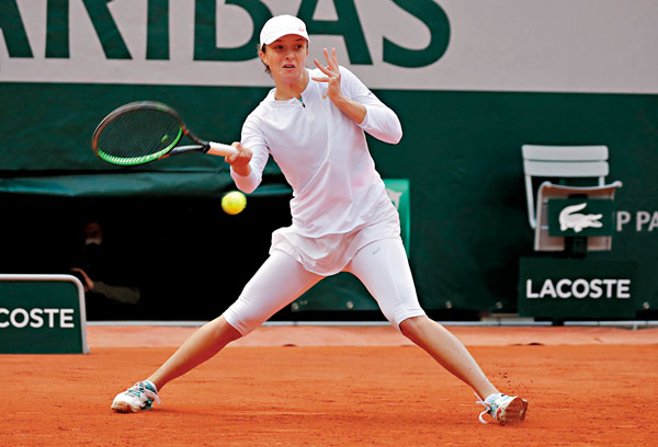 ■施維迪在比賽中回球。  路透社