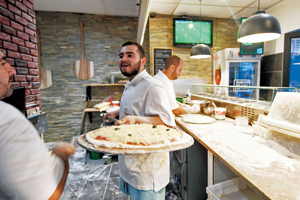 ● Pizza中文稱為比薩餅。 資料圖片