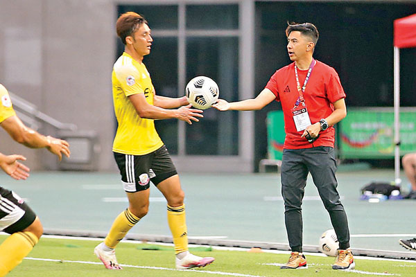 ●李康廉（左）望隨恩師陳曉明衝擊亞洲賽。