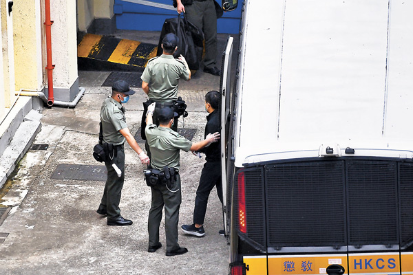 ●羅偉光被押至荔枝角收押所。中新社