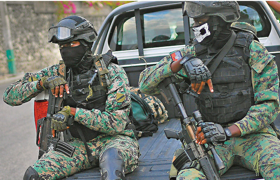 ●海地局勢惡化，士兵加強戒備。 美聯社