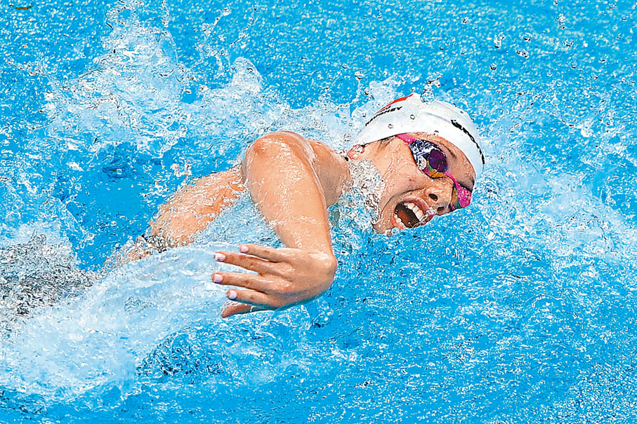 ●「飛魚」何詩蓓奮力擊水。 法新社