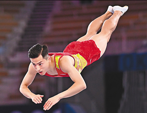 ●在決賽中，董棟以一套精彩的動作拿得高分。 新華社