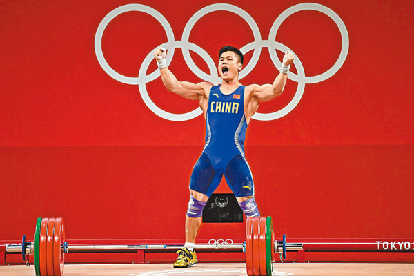●7月31日，在東京奧運會舉重男子81公斤級決賽中，中國選手呂小軍奪冠。 法新社