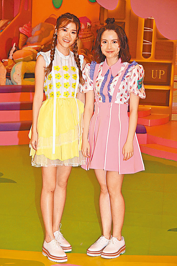 ● 潘靜文（左）與陳煦凝都喜歡與小朋友相處。