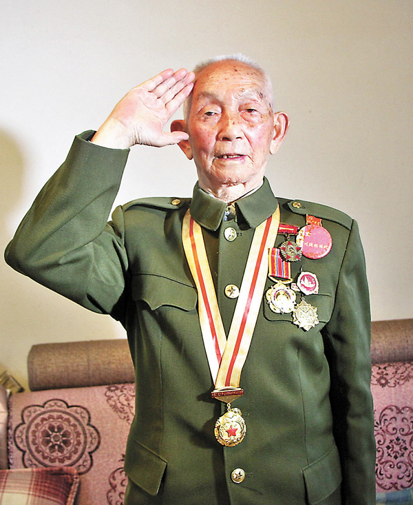 ●紅軍失散人員陳大國全家從戎。香港文匯報記者李兵 攝