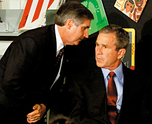 ●布什當年被告知美國遇襲一刻。路透社