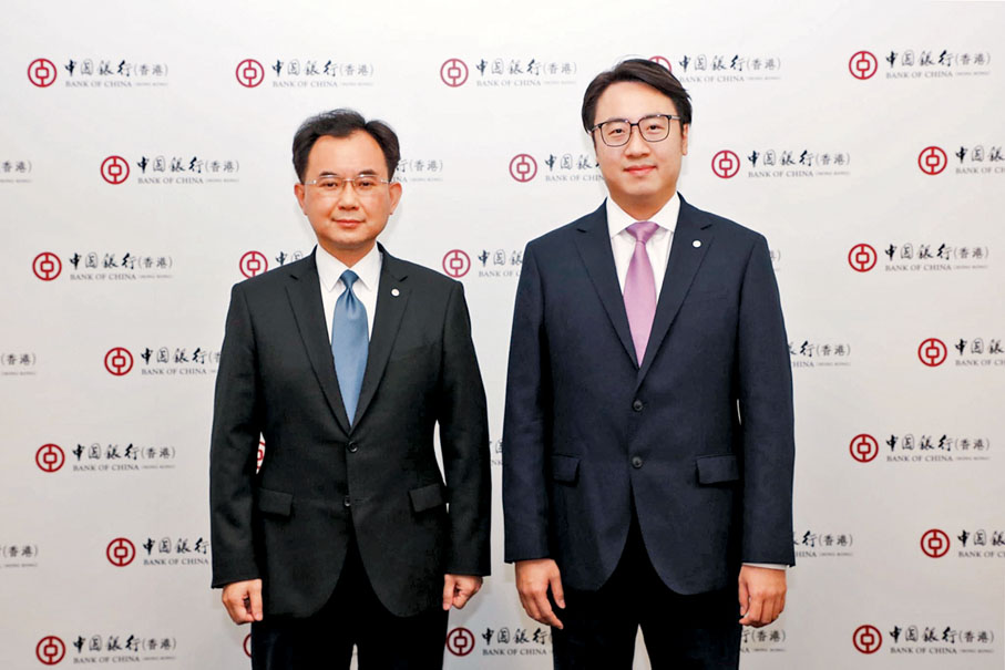 ● 左起:陳文、周國昌。