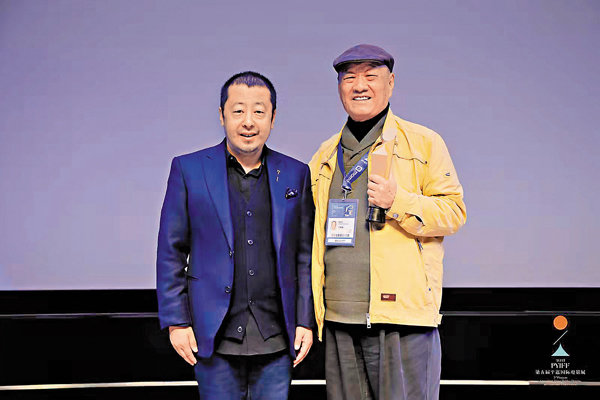 ● 平遙國際電影展創始人賈樟柯與丁蔭楠合影。