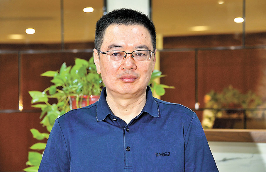 ●通利科技董事長周永南　香港文匯報記者賀鵬飛  攝