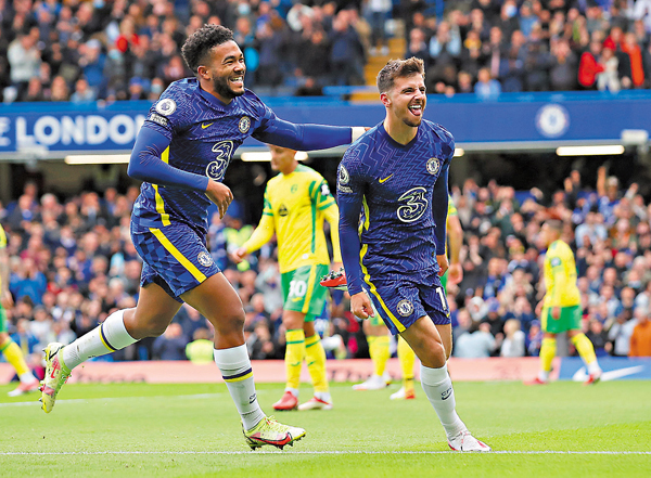 ●美臣蒙特(右)慶祝入波。  路透社