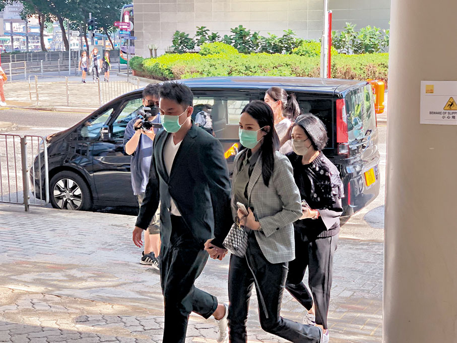 ● 莊思明陪楊明出庭。