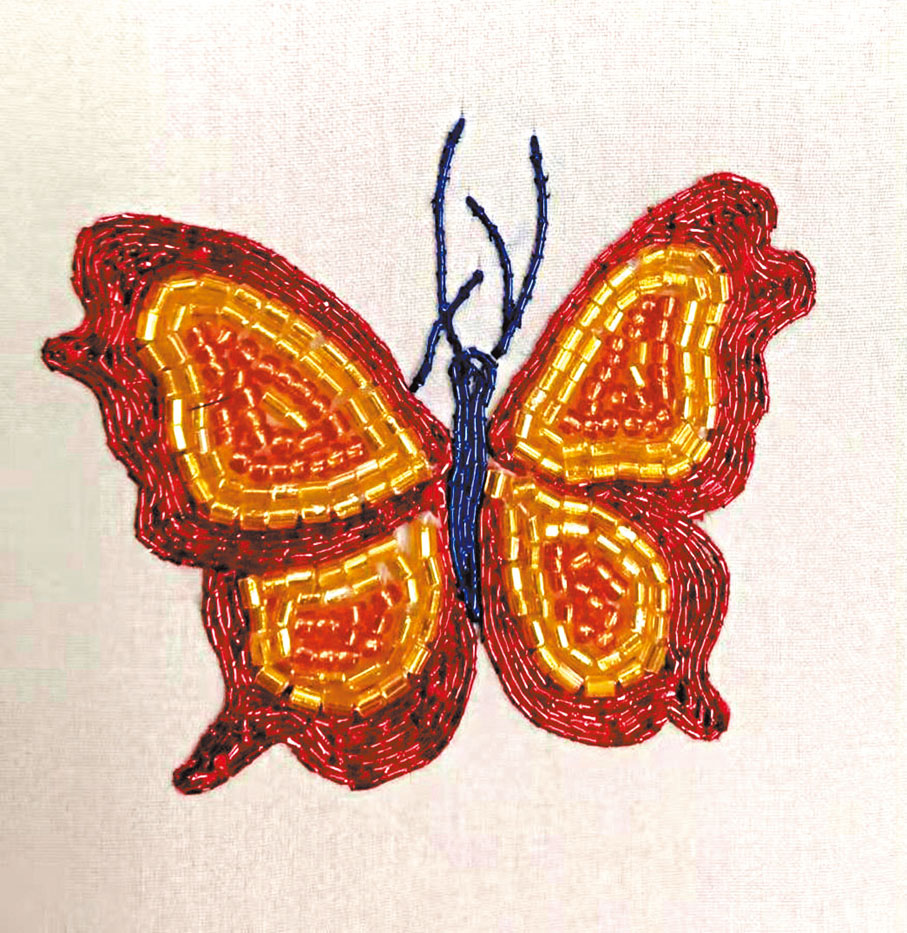 ●蝴蝶繡品。作者供圖