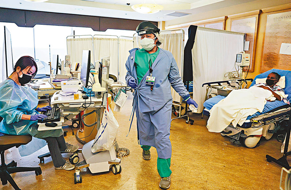 ●美國疫情一波緊接一波，有醫護人員形容如同「活在無休止的危機中」，感到筋疲力竭。 資料圖片