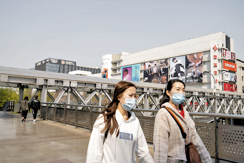 ◆ 評論引述研究指出中國民眾日常生活受的影響小很多。 資料圖片