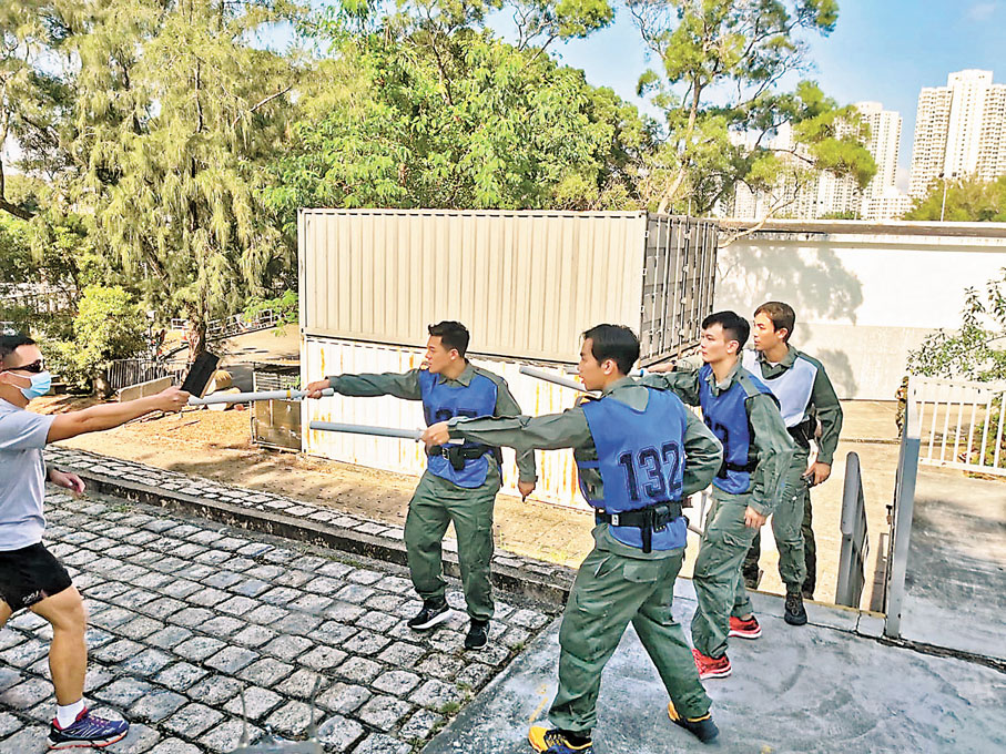 ◆團隊參與模擬案件演習，考驗團隊反應和應變能力。警方圖片