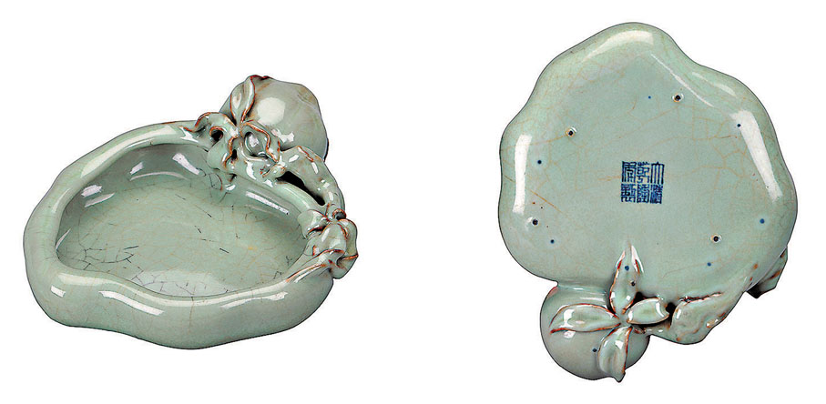 ◆清乾隆仿官釉桃形洗。