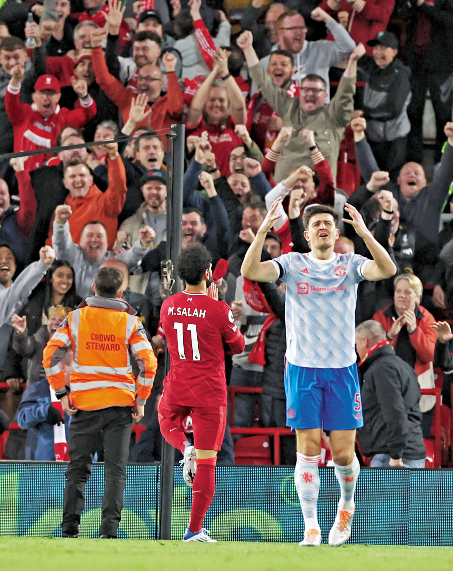 ◆沙拿(11號)來個「金雞獨立」慶祝，無異於在哈利馬古尼(右)傷口上灑鹽。  路透社