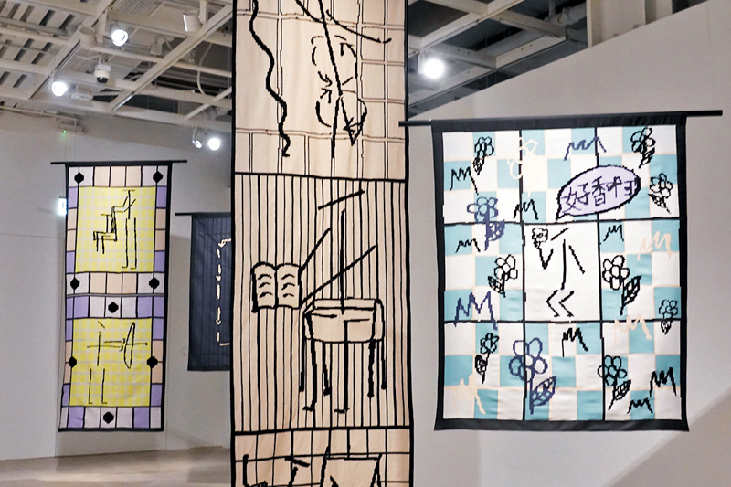 ◆康瑞璟與本地小學生合作完成的大型編織作品。