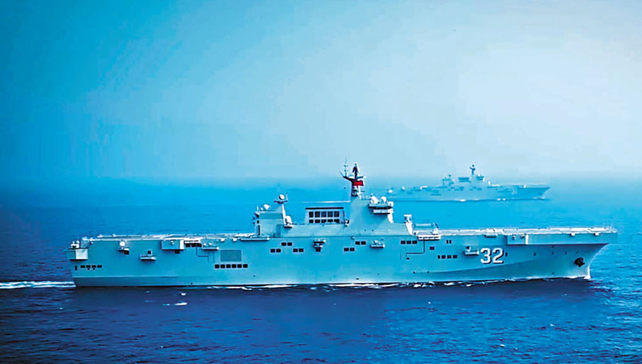 ◆《旗艦戰歌》視頻中出現了廣西艦和海南艦海上並肩航行的畫面，這也是兩艦同框照首次公開。 視頻截圖