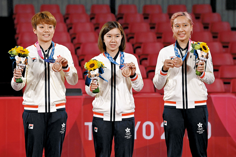 ◆杜凱琹（左起）與隊友李皓晴、蘇慧音奪得東京奧運女團銅牌。 資料圖片