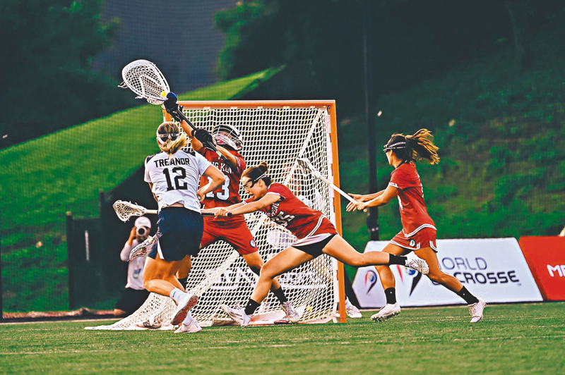 ◆ 港隊（紅衫）已拚盡全力。  香港棍網球總會圖片