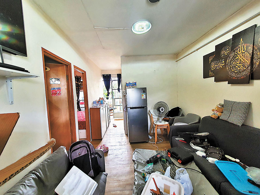 ◆巴基斯坦裔的Ali一家獲分單位雖然是凶宅，但環境很光猛並無陰森感覺。 香港文匯報記者  攝