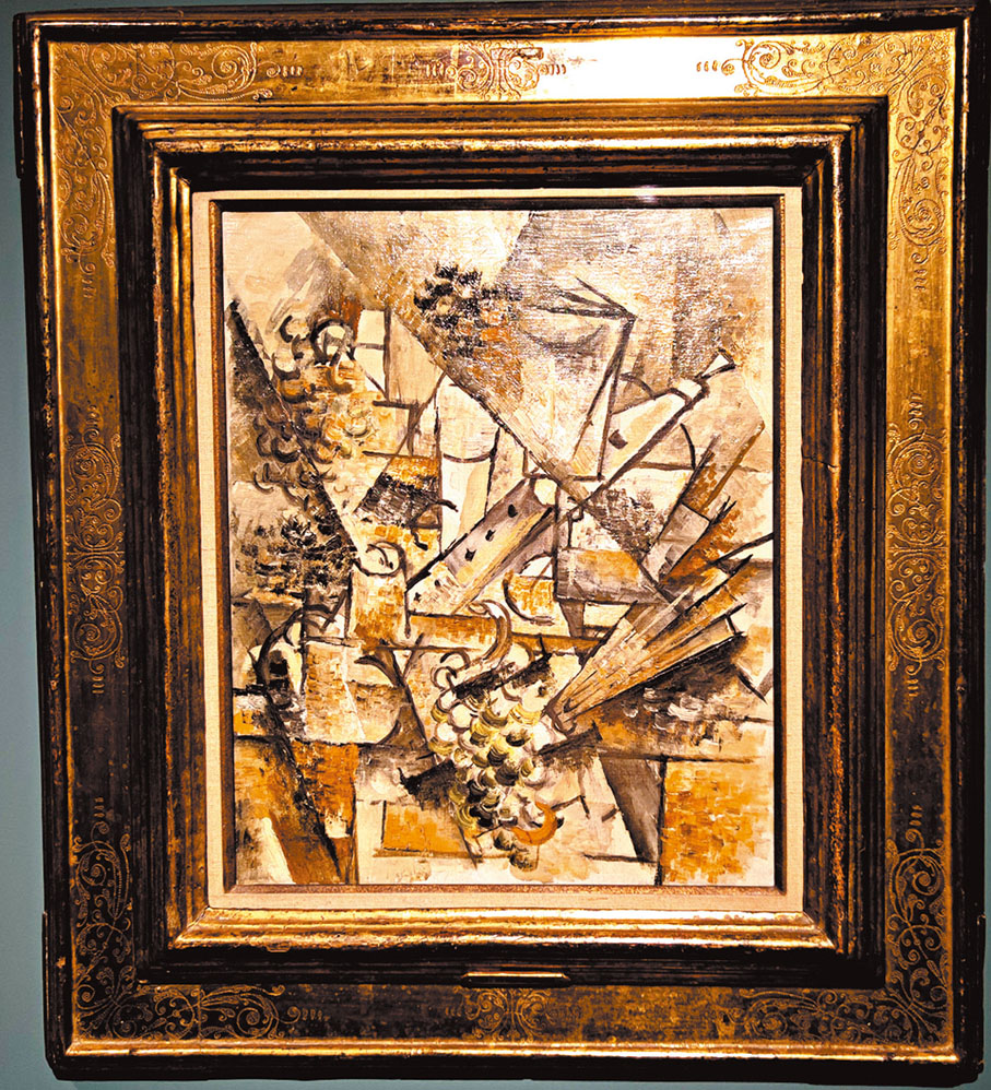 ◆喬治．布拉克《單簧管、風扇和一串葡萄靜物畫》。