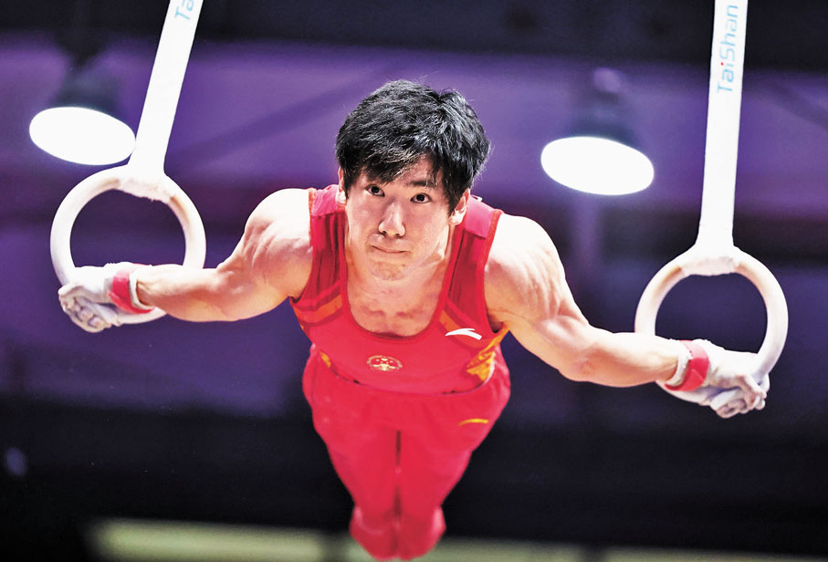 ◆國家隊隊員張博恒在吊環比賽中。 中新社