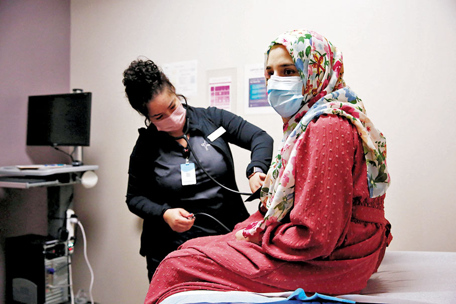 ◆懷孕的蘇珊到診所覆診。 路透社