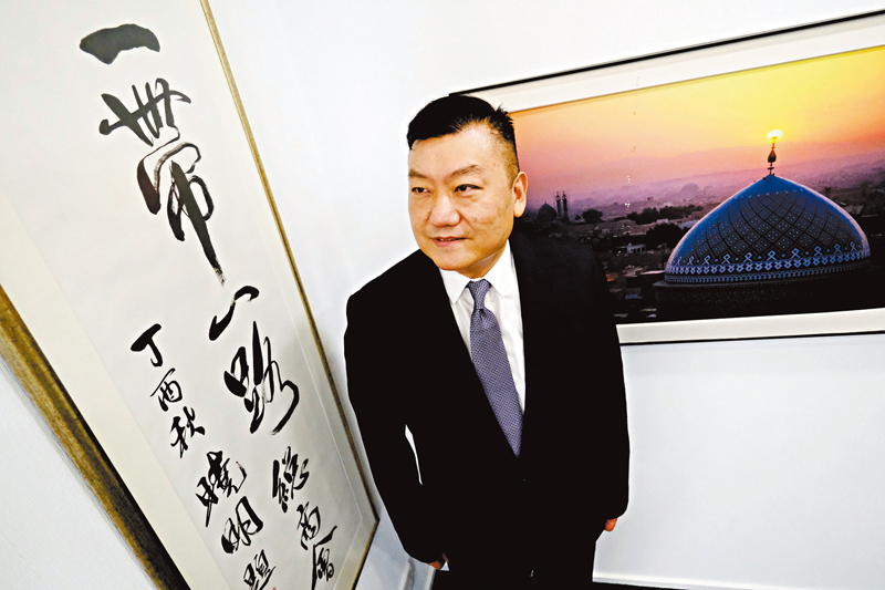 ◆胡劍江期望教材套能助學生認識「一帶一路」及其沿線國家。香港文匯報記者  攝