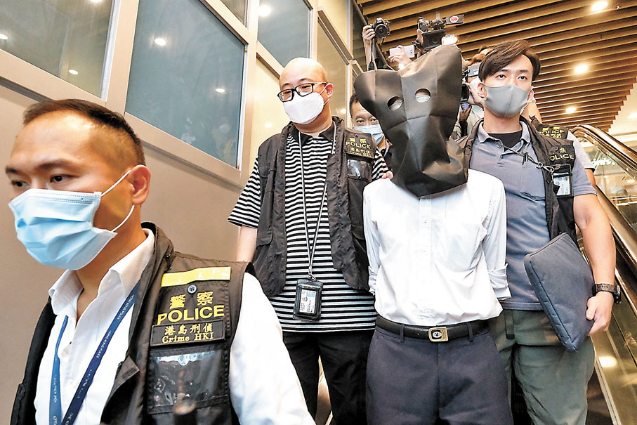 ◆警方拘捕王秉亮醫生，與懷疑濫發「免針紙」有關。香港文匯報記者  攝