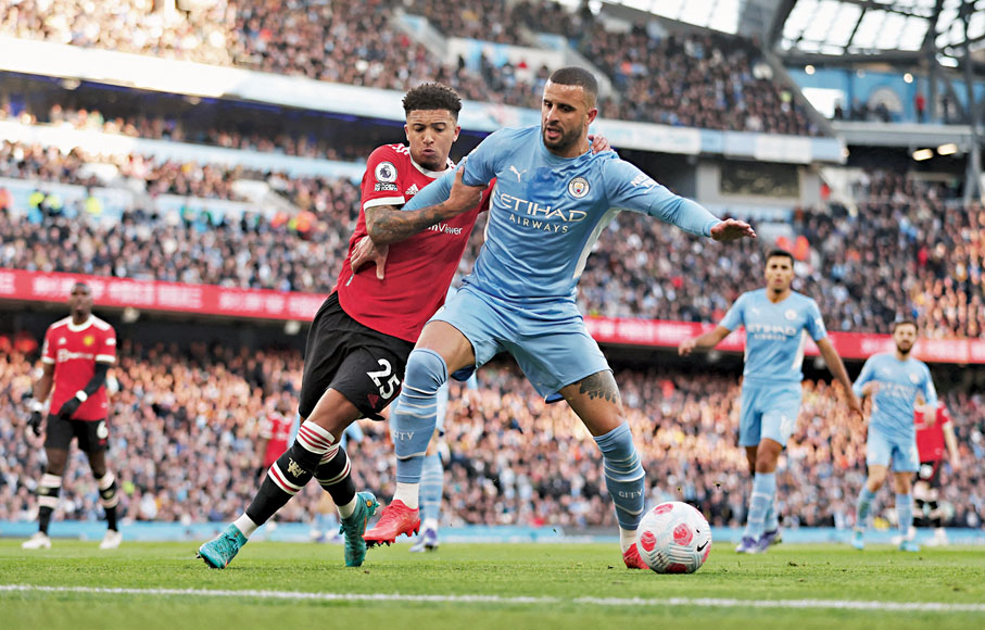 ◆在後防不整之下，周日遇上態勇的曼聯前鋒查頓辛祖(左)，曼城老兵基爾獲加料將受到更大的防守壓力。  路透社