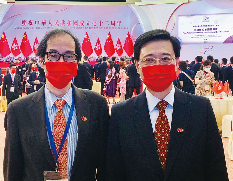 ■2021年，簡植航博士與時任政務司司長李家超在慶祝中華人民共和國成立七十二周年酒會合照。