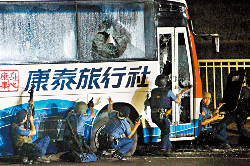 ◆2010年8月,康泰一個21人旅行團在馬尼拉遭革職警員挾持作人質,事件導致康泰領隊及7名團友死亡。資料圖片