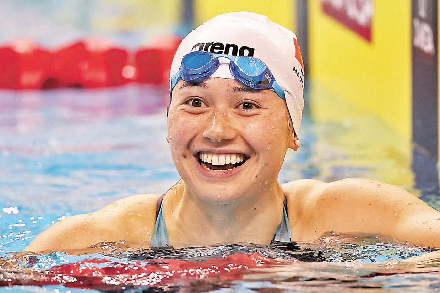 ◆奪冠的何詩蓓笑容燦爛。 法新社