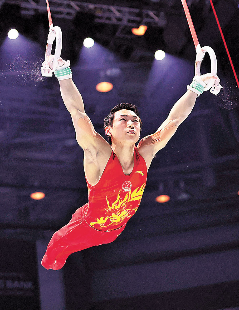 ◆鄒敬園在男子吊環比賽獲得銀牌。 路透社