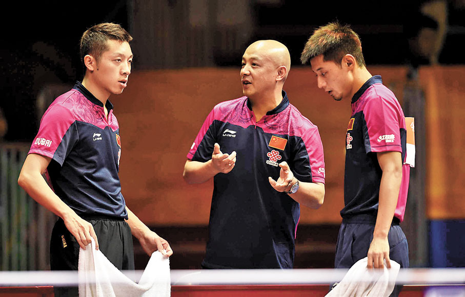 ◆ 肖戰（中）出任混雙教練組組長。資料圖片