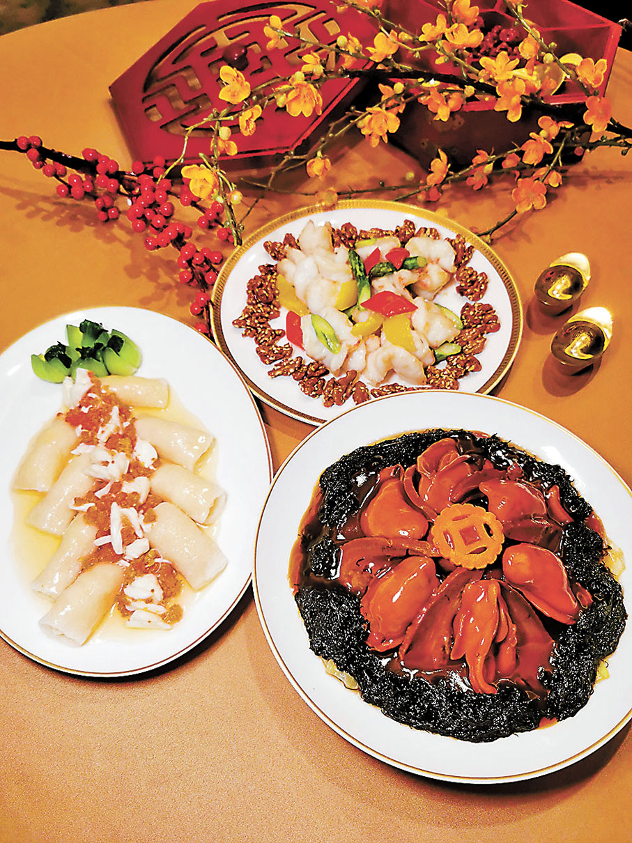 ◆唐閣賀年菜有三款︰鳳舞慶新春（琥珀合桃彩虹炒蝦球）、發財利好市（髮菜金蠔大利）、祝君身壯健（蟹黃百花竹笙卷）。
