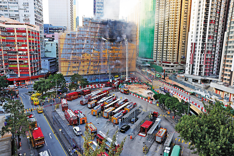 ◆五芳街有不少與永顯工廠大廈「同輩」的舊工廈。 香港文匯報記者鄺福強  攝