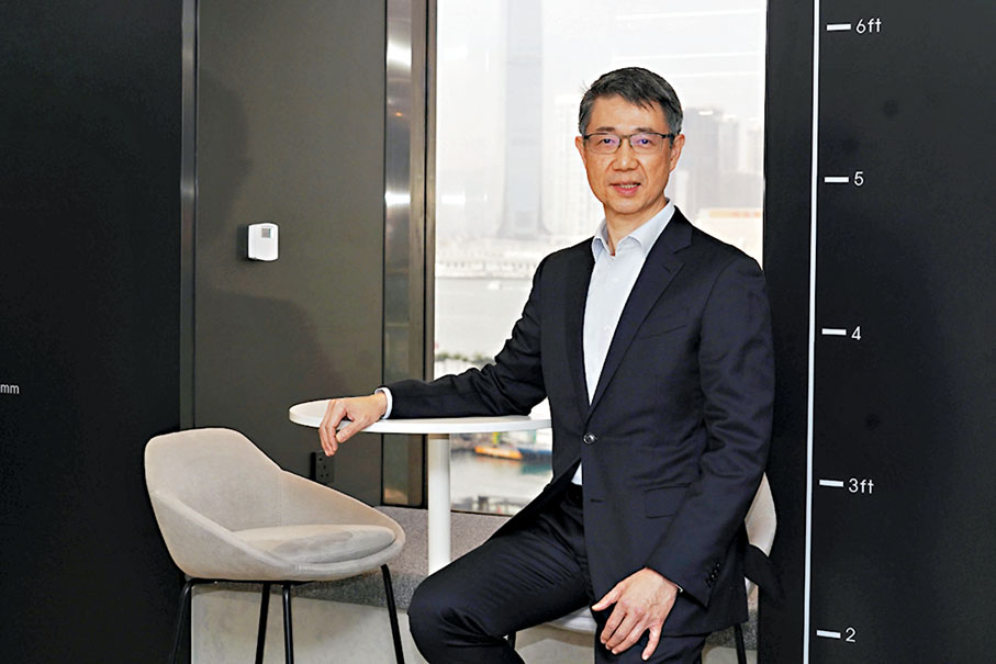 ◆陳康祺指，綠色建築和智能系統有助節省整體開支。記者曾興偉 攝