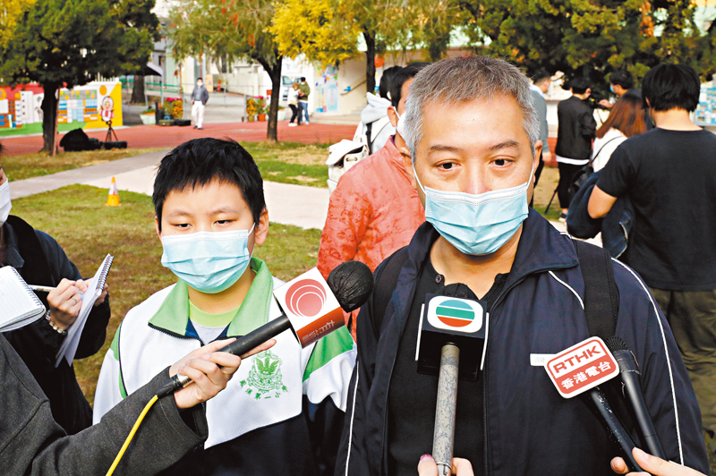 ◆田興宇（左）與爸爸　香港文匯報記者郭木又 攝