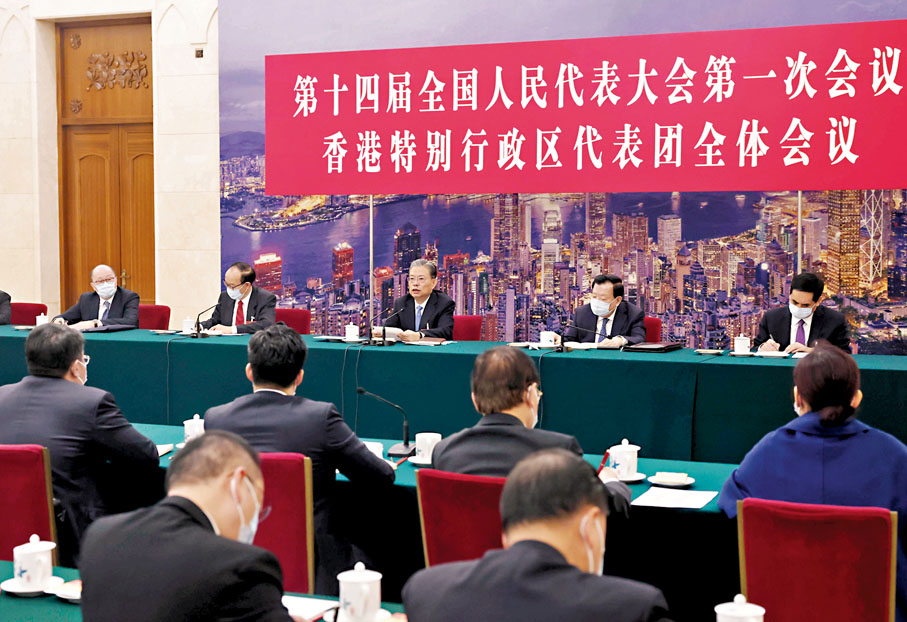 ◆3月7日，中共中央政治局常委趙樂際參加十四屆全國人大一次會議香港代表團的審議。 新華社