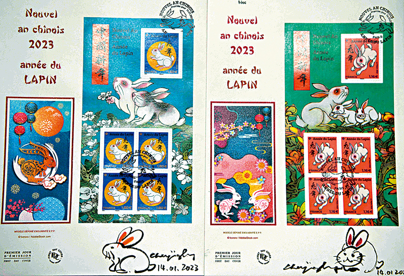 ◆發行的兔年郵票首日封，首日封封底為生肖郵票設計師、法籍華裔畫家陳江洪現場繪製的兔子畫作。