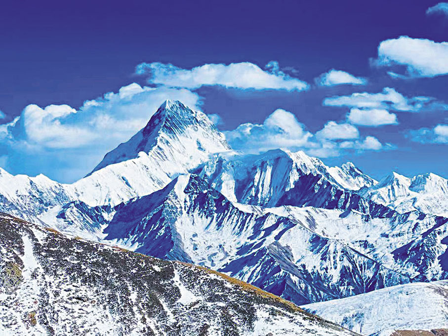 ◆茶馬古道上的貢嘎雪山。 作者供圖