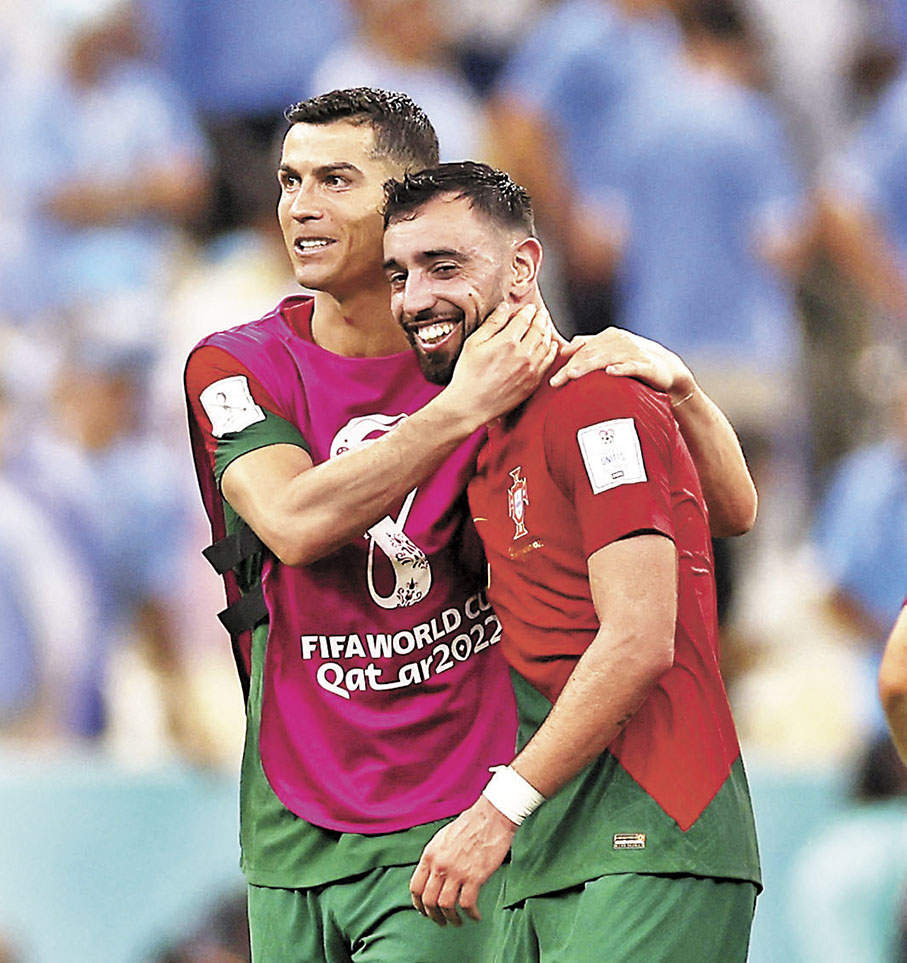 ◆C朗(左)和般奴費南迪斯以大將身份提攜葡萄牙後進。  資料圖片