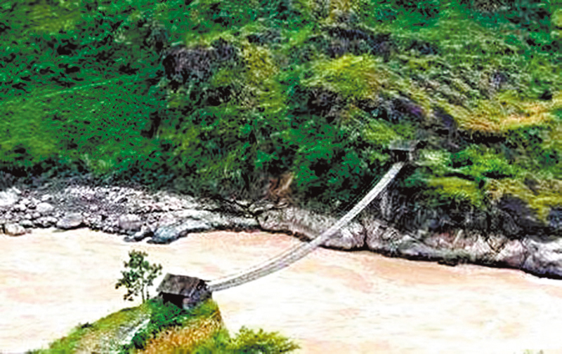 ◆金龍橋橫掛金沙江兩岸岩壁。 作者供圖