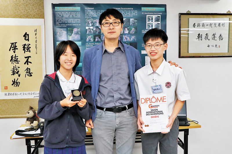 ◆漢鼎書院學生雷致遠和漢基國際學校學生盧瀅檀合作研究「猴臉識別」獲獎。香港文匯報記者北山彥  攝