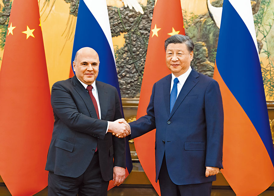 ◆5月24日下午，國家主席習近平在北京人民大會堂會見來華進行正式訪問的俄羅斯總理米舒斯京。 新華社